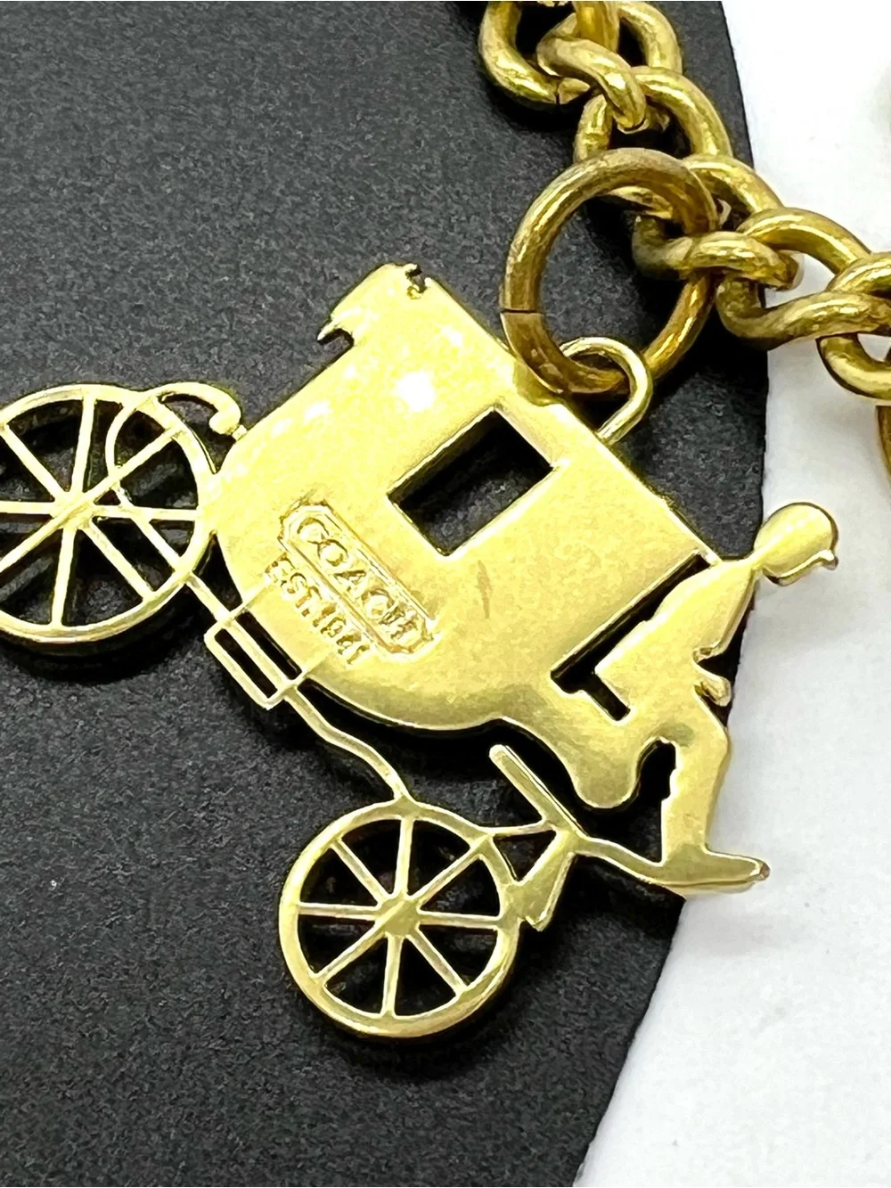 Coach Gold Tone Charm Bracelet with Carriage Charms